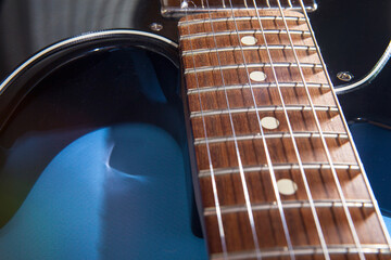 Detail of electric guitar close-up. Vintage style