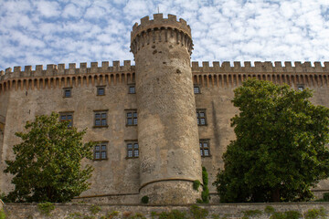 Fototapeta na wymiar Picture of Cylindrical fortification of Orsini Odescalchi Castle in Bracciano,a particularly well-preserved medieval castle.Popular tourists come to visit