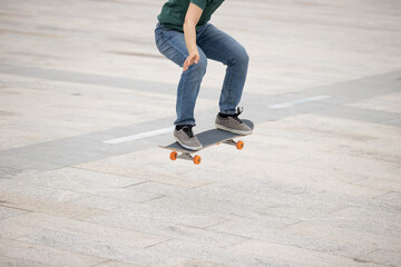 Skateboarder skateboarding outdoors in the morning