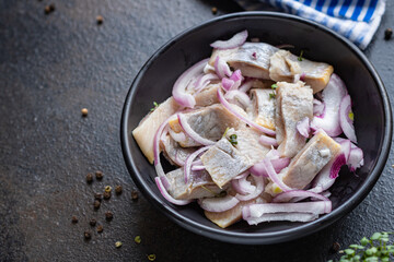 salad herring slice fish salty fresh seafood appetizer on the table pescetarian diet meal top view copy space healthy food background