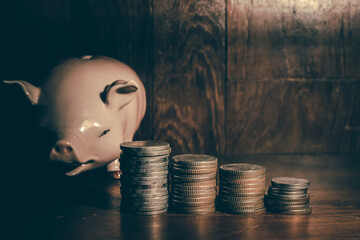 Gold coins stacks is representing riches and wealth management. Coin stack growing and find out the...