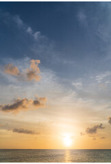 sunset over the sea vertical in the evening
