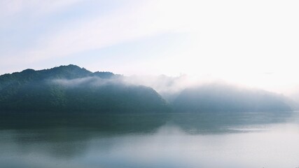 Fototapeta na wymiar mountains in the mist in the morning