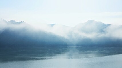 Obraz premium mountains in the mist in the morning