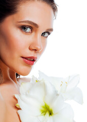 Fototapeta premium young pretty woman with Amarilis flower close up isolated on white