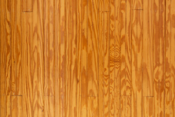 Stained wood panels with details of the wood grain evident. Background.