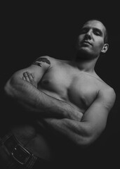 Naklejka premium Shirtless sexy strong man portrait in black and white