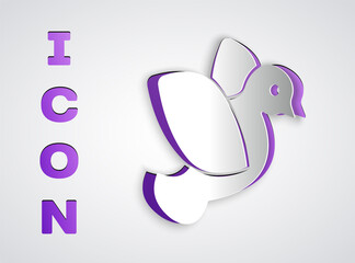 Paper cut Dove icon isolated on grey background. Paper art style. Vector