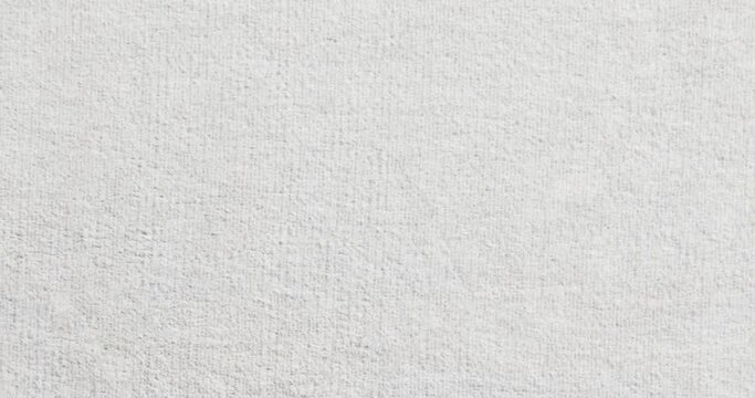 Loopable white paper background texture, Seamless white paper pattern in slow motion, 4K blank endless beige background. Background for titles or credits.