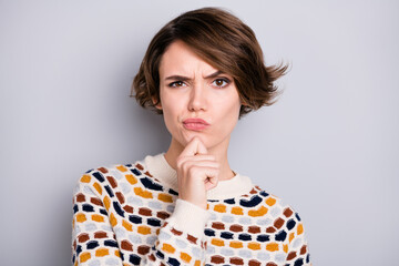 Portrait of pretty minded skeptic brown-haired girl overthinking isolated over grey pastel color...