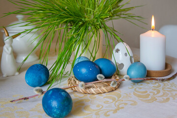 Natural dyed blue colored Easter eggs on the table. Happy Easter.