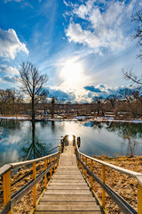 Fototapeta premium wooden bridge to the reservoir
