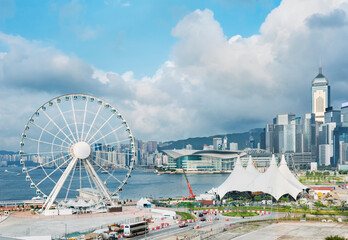 Ferris wheel in downtown of Hong Kong city