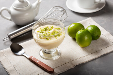 Lemon mousse with lemon zest on top.