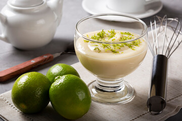 Lemon mousse with lemon zest on top.