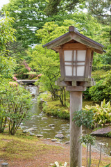 Wooden Lantern in Japanese Garden Kenrokuen in Kanazawa, Japan
