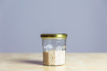 Bread sourdough starter in a jar.