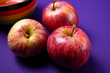 red apples on blue background