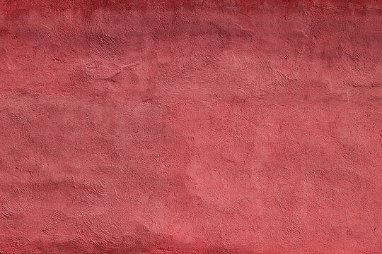 Red stucco finish plaser wall