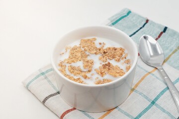 Cornflakes cereal and milk. Morning breakfast