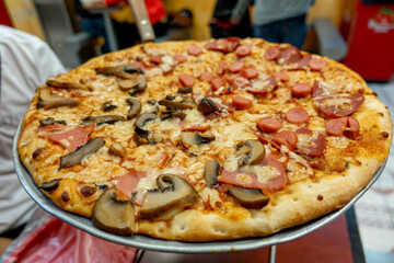 a slice of pizza and pizza