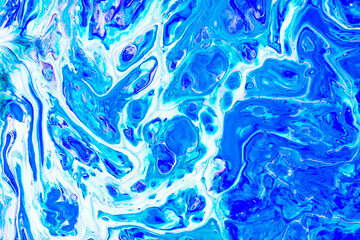 multicolor paint spilled onto the canvas, creating an interesting abstract drawing, a pattern of lines, halftones, causing different associations in your design. fluid art