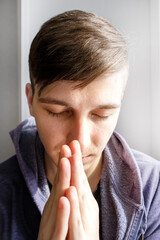 Young Man praying