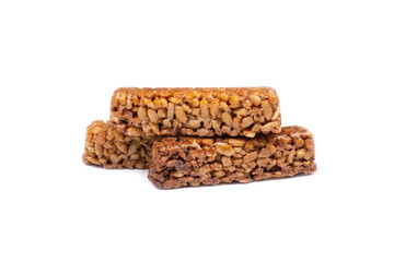 seeds in caramel, oriental dessert, fitness diet snack kozinak isolated on white background.