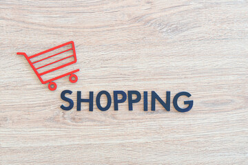 Fototapeta na wymiar shopping cart icon concept cut out letters, sale store business, simple minimalistic