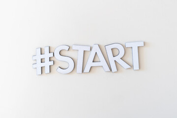 flat lay of hashtag word start, concept of new  activity