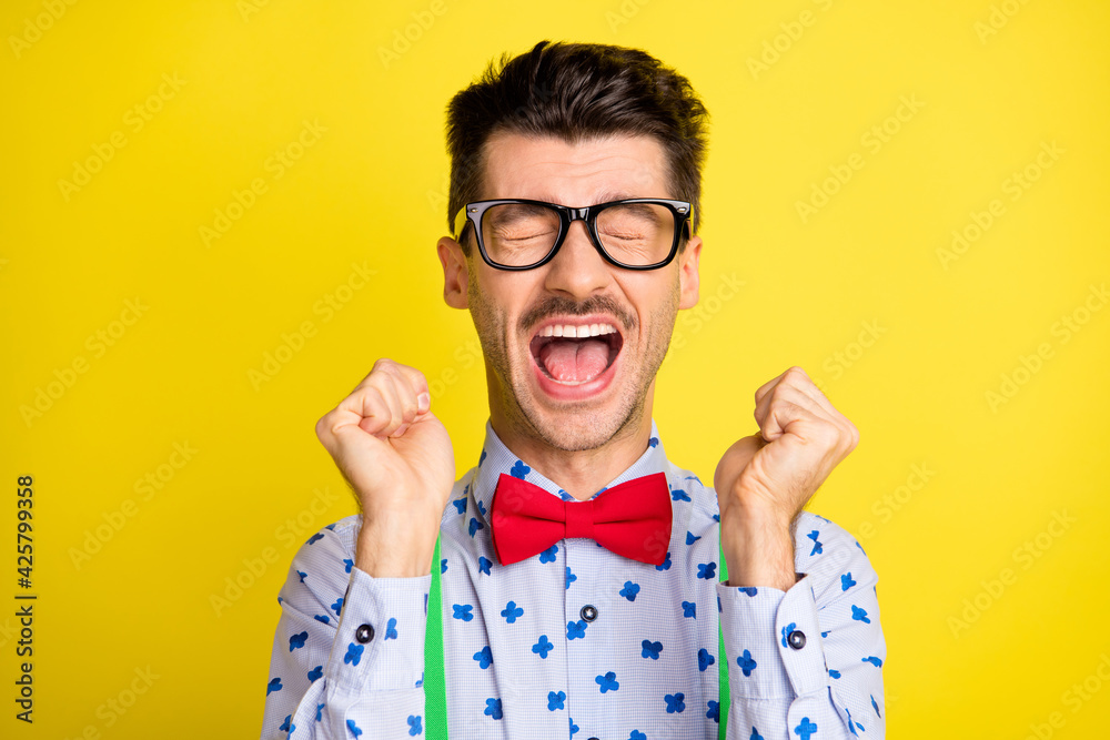 Poster Photo of young man unhappy upset depressed cry problem sad yell isolated over yellow color background