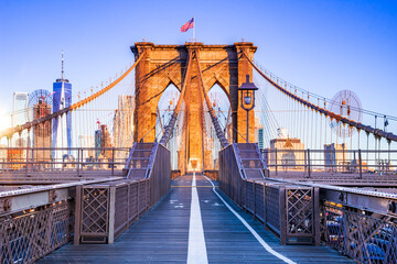 Brooklyn Bridge and Manhattan sunrise, New York City in USA.