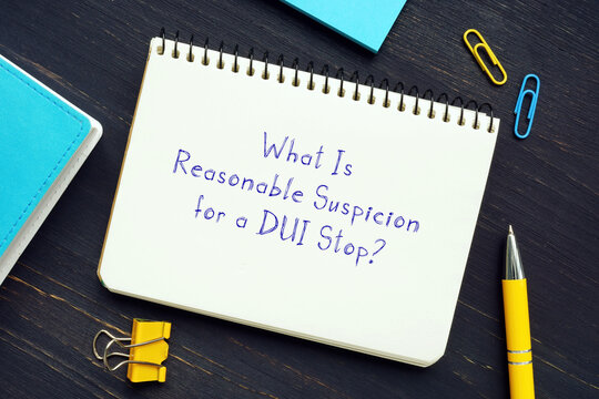  What Is Reasonable Suspicion For A DUI Stop? Sign On The Piece Of Paper.