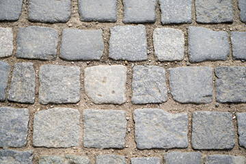 Structure of a stone as a pavement slab or as a brick