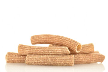 Dark brown, uncooked, organic rye pasta, close-up isolated on white.
