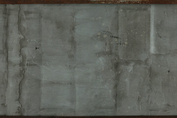 Concrete wall with metal frame