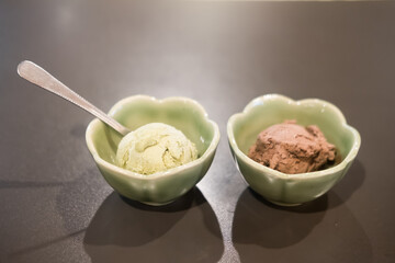 Ice cream scoops or balls, chocolate flavor and green tea flavor