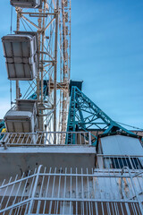 Steel structure of Ferris wheel. Lines of modern architecture and equipment.