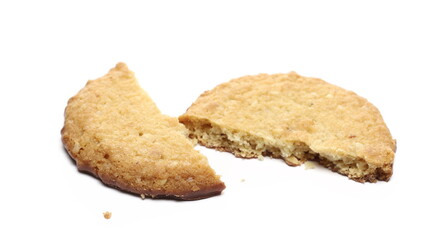 Oat cookies with milk chocolate and crumbs isolated on white background