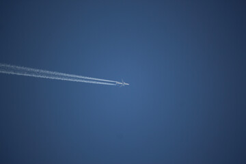 Clear blue skies with passengers being flown through it