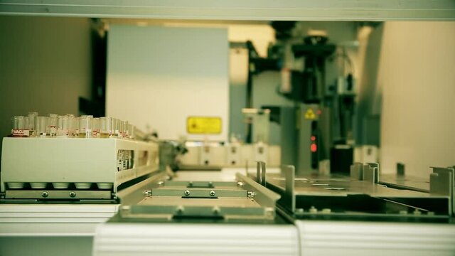 Automated laboratory for blood testing. The robot is doing the PCR test Covid 19. Antibody test