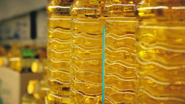 bottles of sunflower oil close up at the grocery store. Close-up selective focus