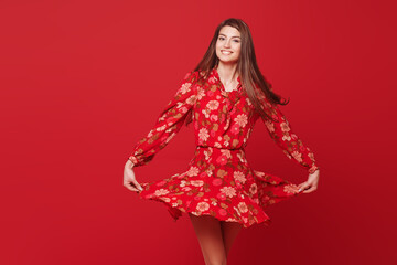 dancing girl in red dress