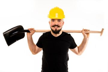 The man dressed in a black shirt poses in a photo studio.