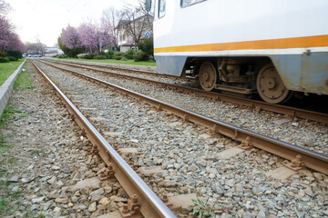 Obraz premium Tram rails. The forces of a Bucharest tram in the spring of 2021, Bucharest, Romania. Photo during the day.