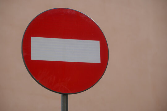 Road traffic sign. Meaning forbidden. Photo during the day.
