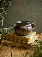 still life with books and cup of coffee