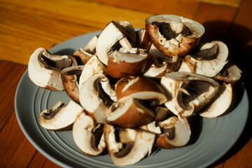 Fresh organic mushrooms cut and ready to be cooked.