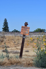 Warning no trespassing sign near the railroad tracks