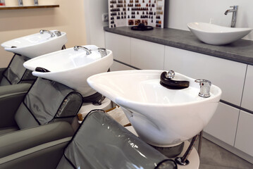 Hairdressing salon with hair wash basins chair wiht sink